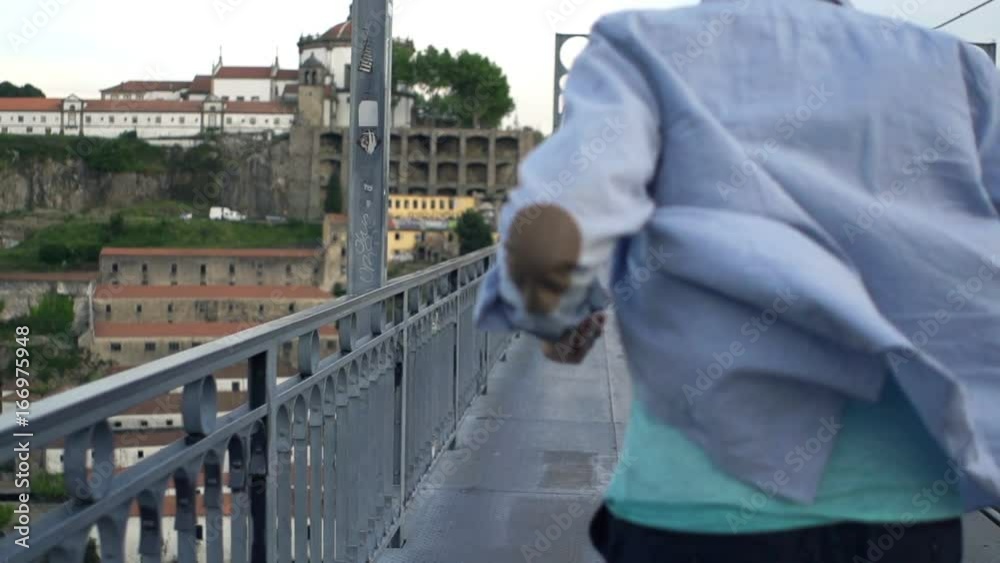 Late man running on bridge in hurry in Porto, Portugal, super slow motion 240fps
Late man running on bridge in hurry in Porto, Portugal, super slow motion 240fps