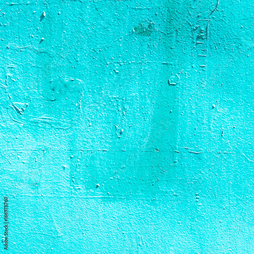 Old grunge cyan painted wall