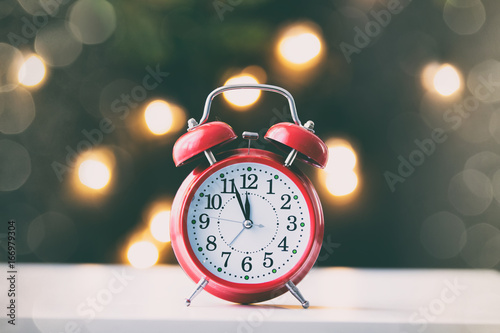 Red alarm clock with Christmas Fairy Lights