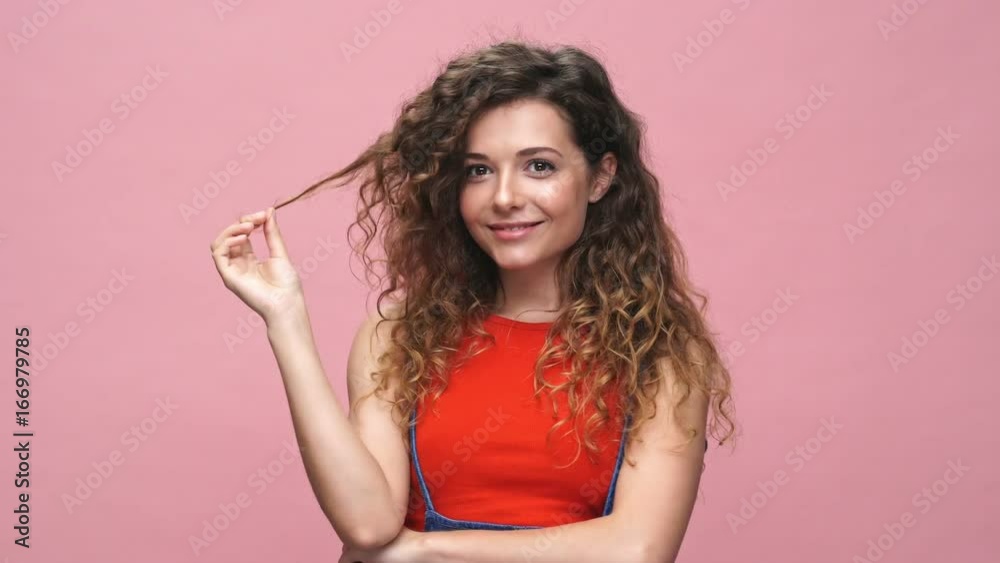 Young cheerful caucasian woman over pink background Young cheerful caucasian woman over pink background