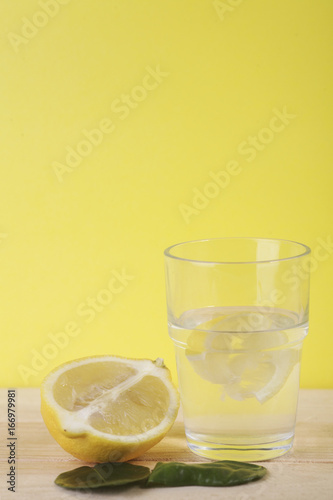 Lemon and lemongrass on wooden background. Healthy lifestyle. Detox