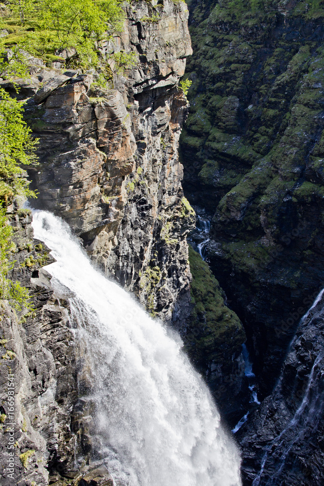 Obraz premium Mountain landscape in Norway, a snowy mountain, nature, Northern Norway, waterfall