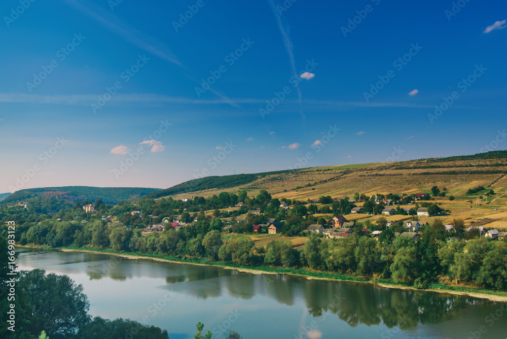Dnister river landscape in Ternopil region of western Ukraine. Idillyc view to the small villadge Dnister river landscape in Ternopil region of western Ukraine. Idillyc view to the small villadge