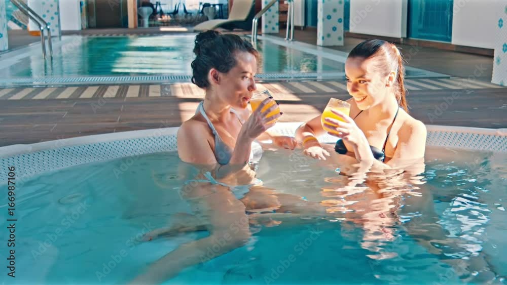 Friends Enjoying In The Jacuzzi Friends Enjoying In The Jacuzzi