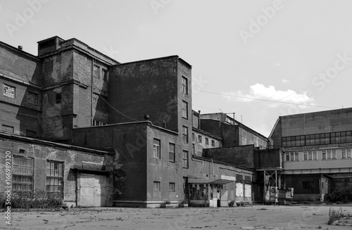 Cyprian buildings of an old factory of the Soviet period. Monochrome image