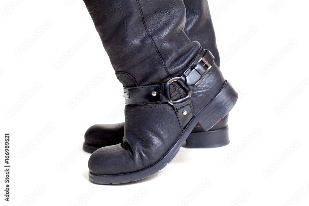 Two leather boots on white background closeup Two leather boots on white background closeup