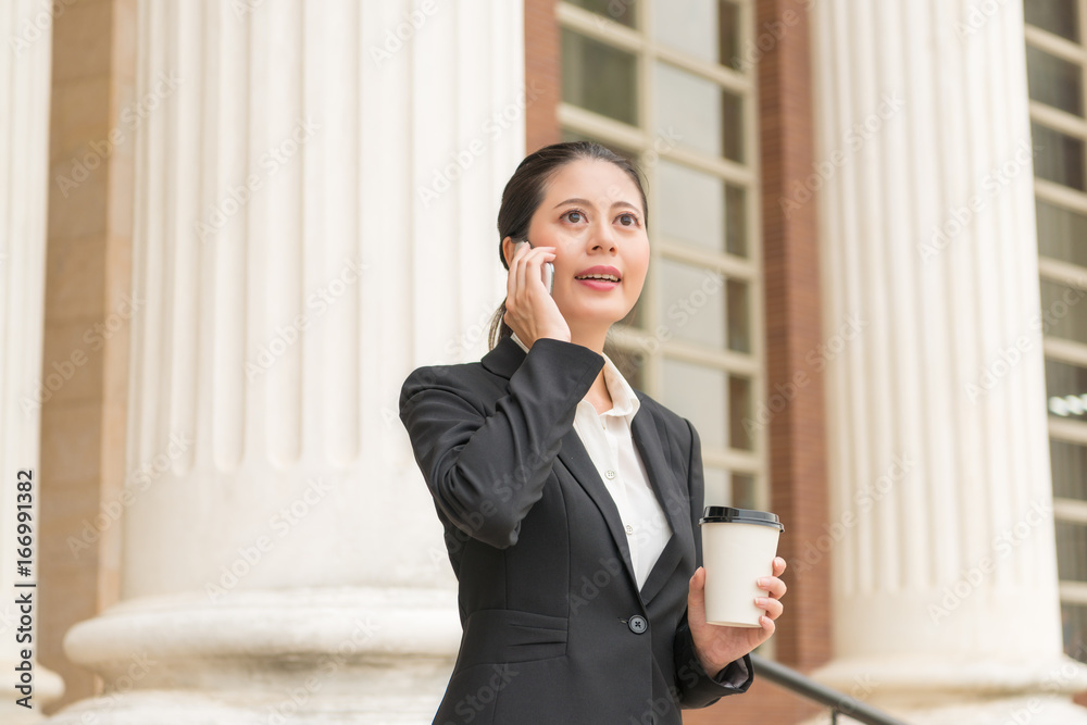 young beautiful female business lawyer calling