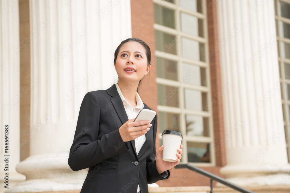 smiling female lawyer holding coffee paper cup smiling female lawyer holding coffee paper cup