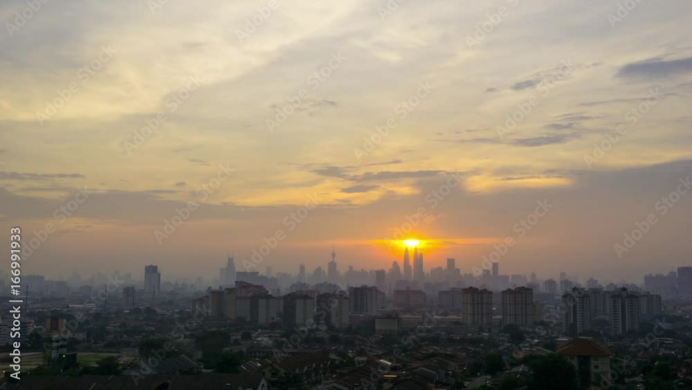 Time lapse of cloudy sunset over downtown Kuala Lumpur, Malaysia Time lapse of cloudy sunset over downtown Kuala Lumpur, Malaysia
