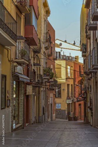 Old street in a small Spanish town Palamos in Spain
