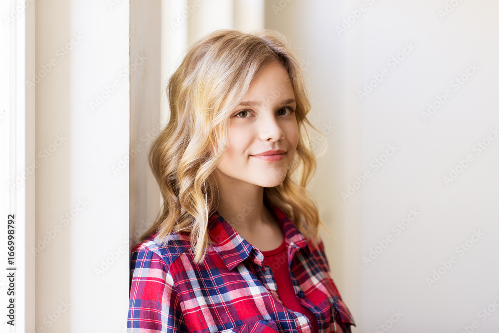 portrait of smiling young woman or teenage girl portrait of smiling young woman or teenage girl