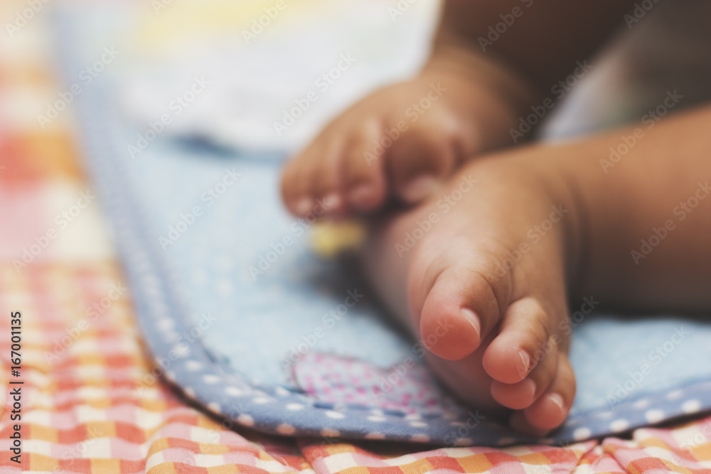 A cute feet of baby boy sleeping. A cute feet of baby boy sleeping.
