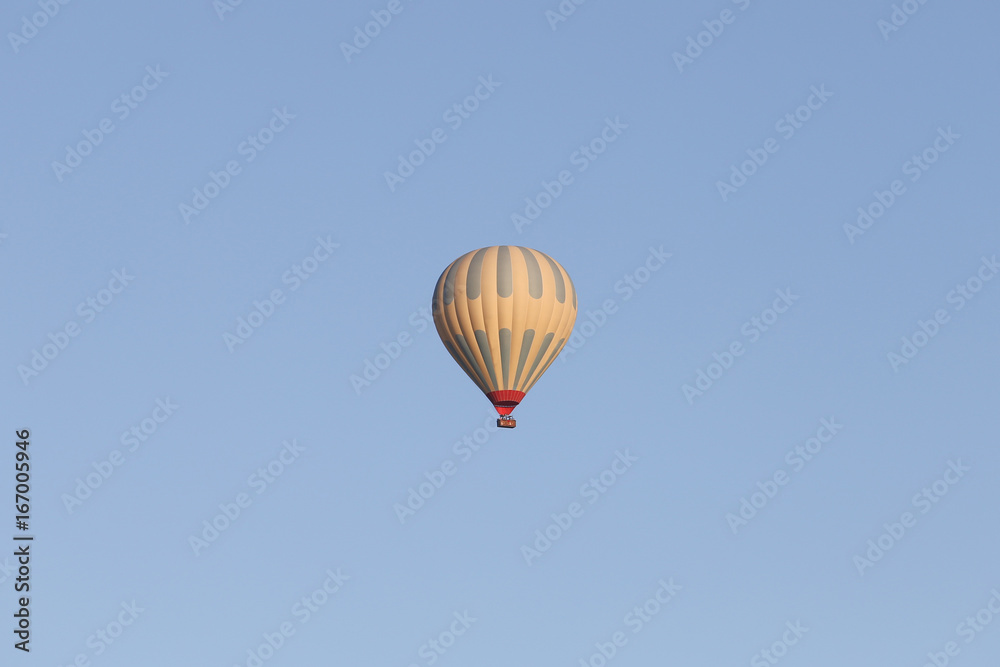 Naklejka premium Hot Air Balloon Over Goreme Town