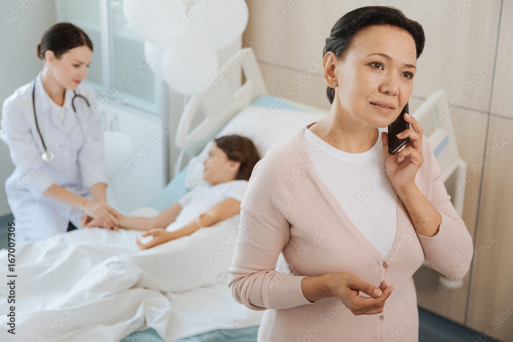Good looking anxious woman making a call Good looking anxious woman making a call