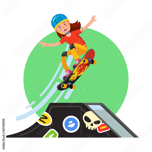 Teen doing stunt jump from ramp on skateboard