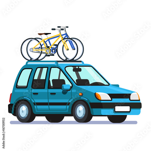 Wagon car with two bicycles mounted on roof rack