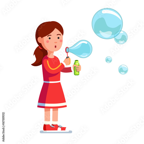 Girl kid blowing bubbles holding bottle with soap