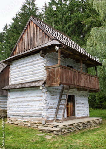 Wooden cottage in village
