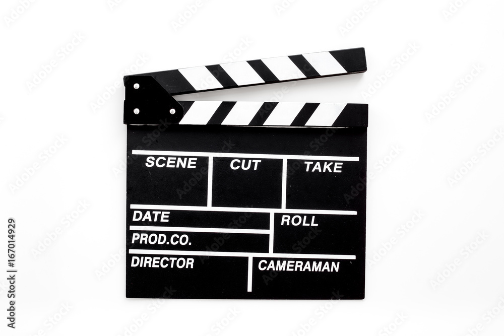Filmmaker profession. Clapperboard on white background top view
