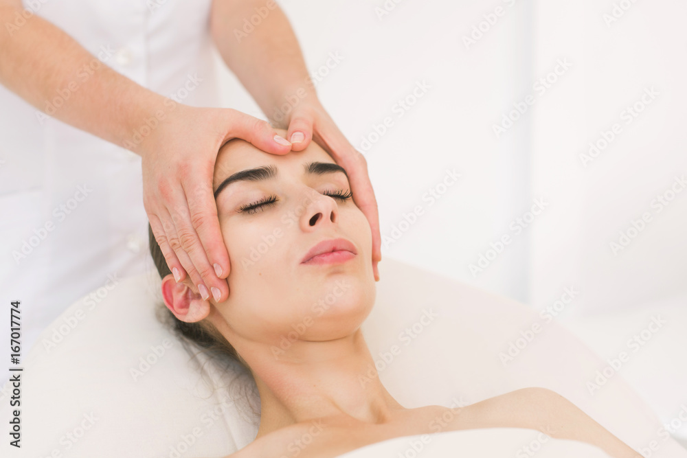 Massage face girl close-up.