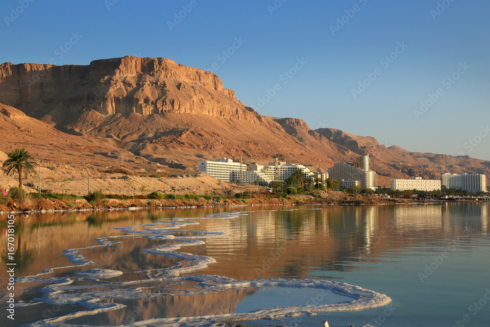 The dead sea resorts in Israel. View of the hotel and the beach