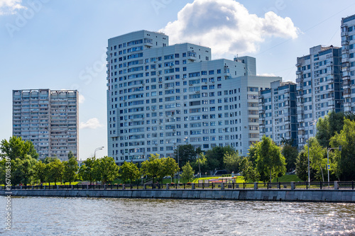 A large multi-storey building on the outskirts of the city. View from the Moscow River  
