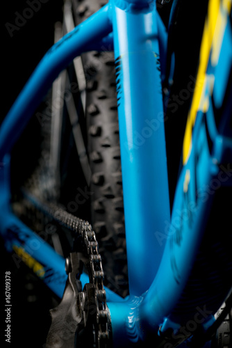 mountain bicycle photography in studio, bike parts, chain detail © martingaal