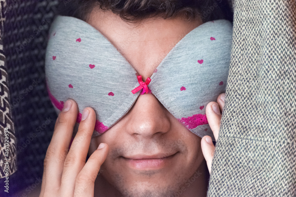 A Young Man In The Closet With A Bra On His Face. Stock Photo, Picture and  Royalty Free Image. Image 90317444.