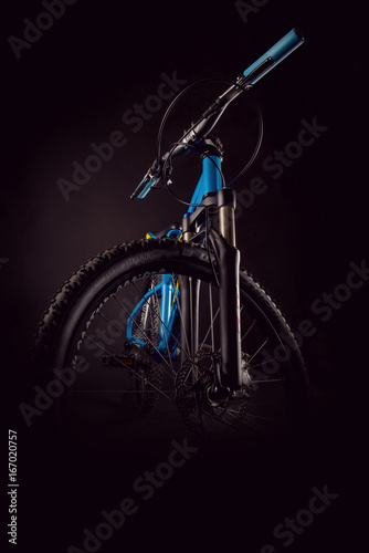 mountain bicycle photography in studio, cushioning bike frame parts, handle bar and brakes
