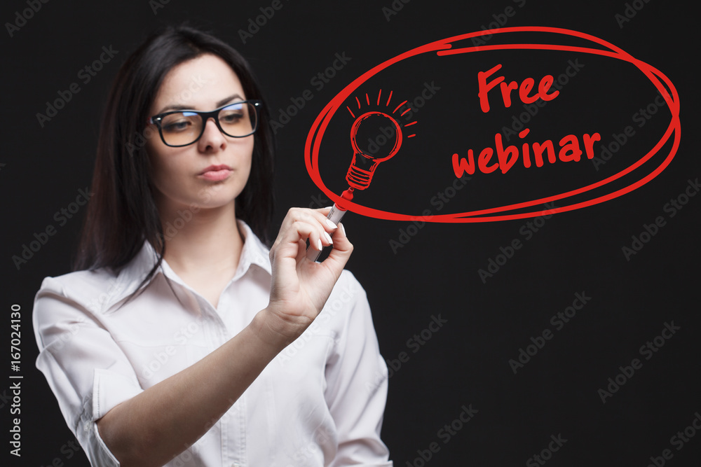 The concept of business, technology, the Internet and the network. A young entrepreneur working on a virtual screen of the future and sees the inscription: Free webinar The concept of business, technology, the Internet and the network. A young entrepreneur working on a virtual screen of the future and sees the inscription: Free webinar