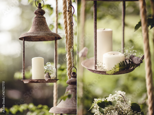 Wedding decor with flowers and candles in the forest
