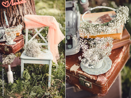 Wedding decor with flowers and candles in the forest