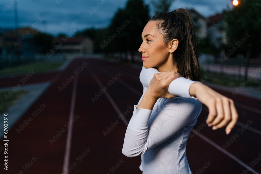 Beautiful young woman stretching out her arms Beautiful young woman stretching out her arms