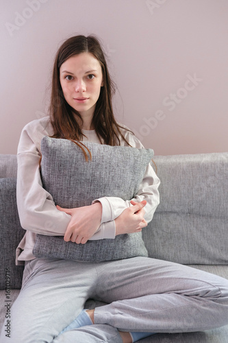 Lonely depressed woman at home photo