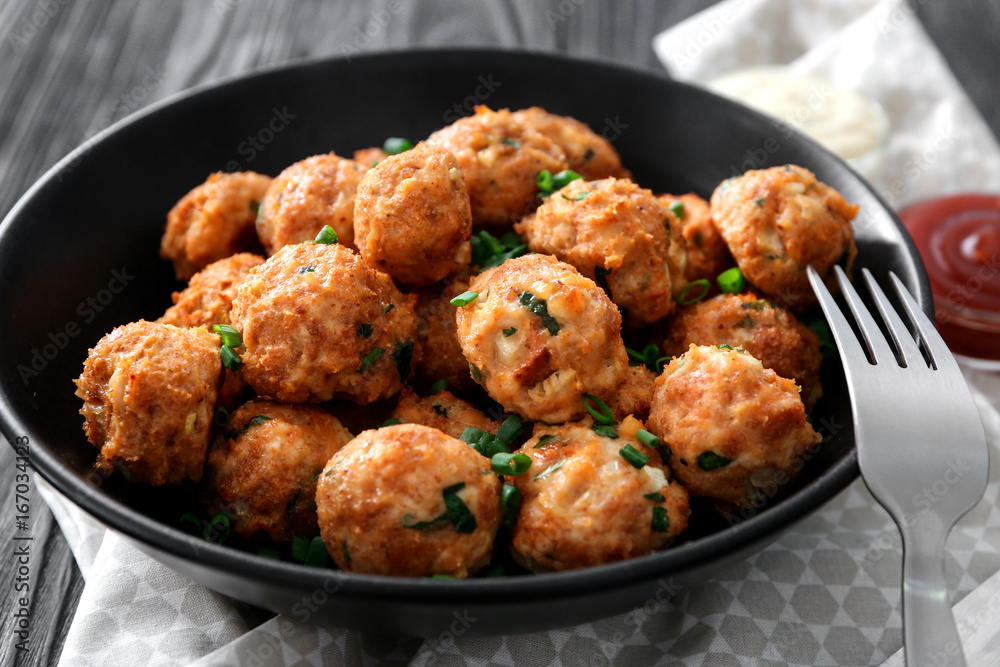 Plate with delicious turkey meatballs on table, closeup Plate with delicious turkey meatballs on table, closeup