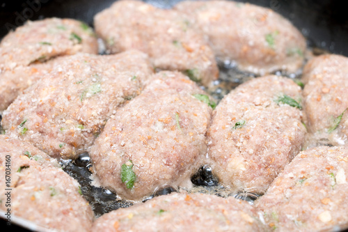 cutlets fried in a pan