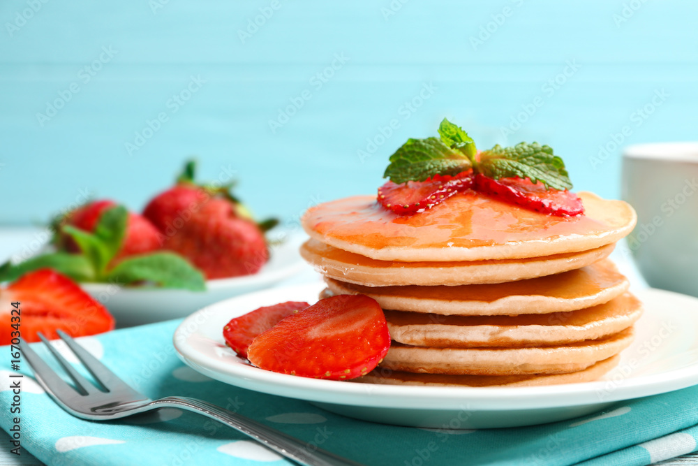 Plate with delicious pancakes on table Plate with delicious pancakes on table