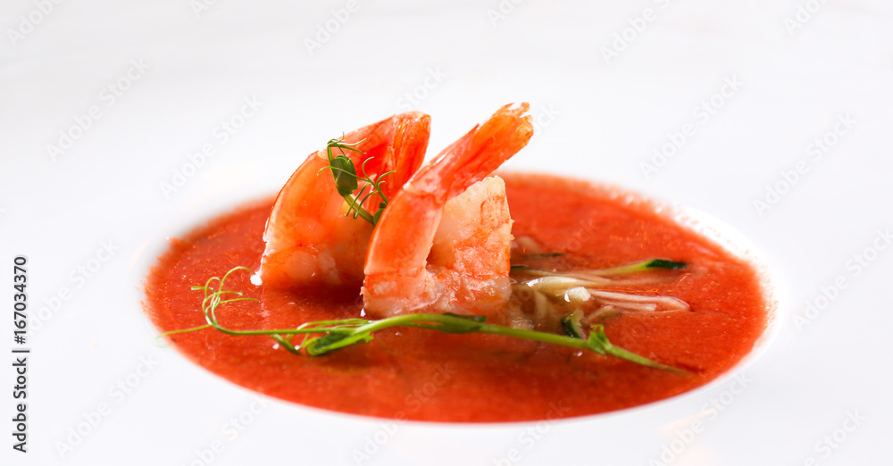 Delicious soup with shrimps in plate