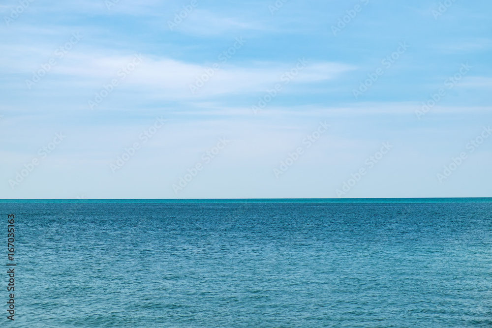 A simple seascape, the blue sea and the clear sky in Langkawi Island, Malaysia. Abstract natural background