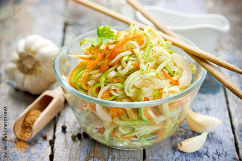 Zucchini noodles with carrot, garlic and spices