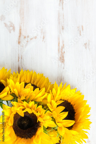 Fototapeta Naklejka Na Ścianę i Meble -  Yellow Sunflower Bouquet on White Rustic Background