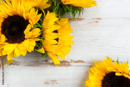 Fototapeta Naklejka Na Ścianę i Meble -  Yellow Sunflower Bouquet on White Rustic Background
