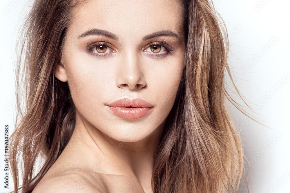 Beauty portrait of attractive girl with glamour makeup.
