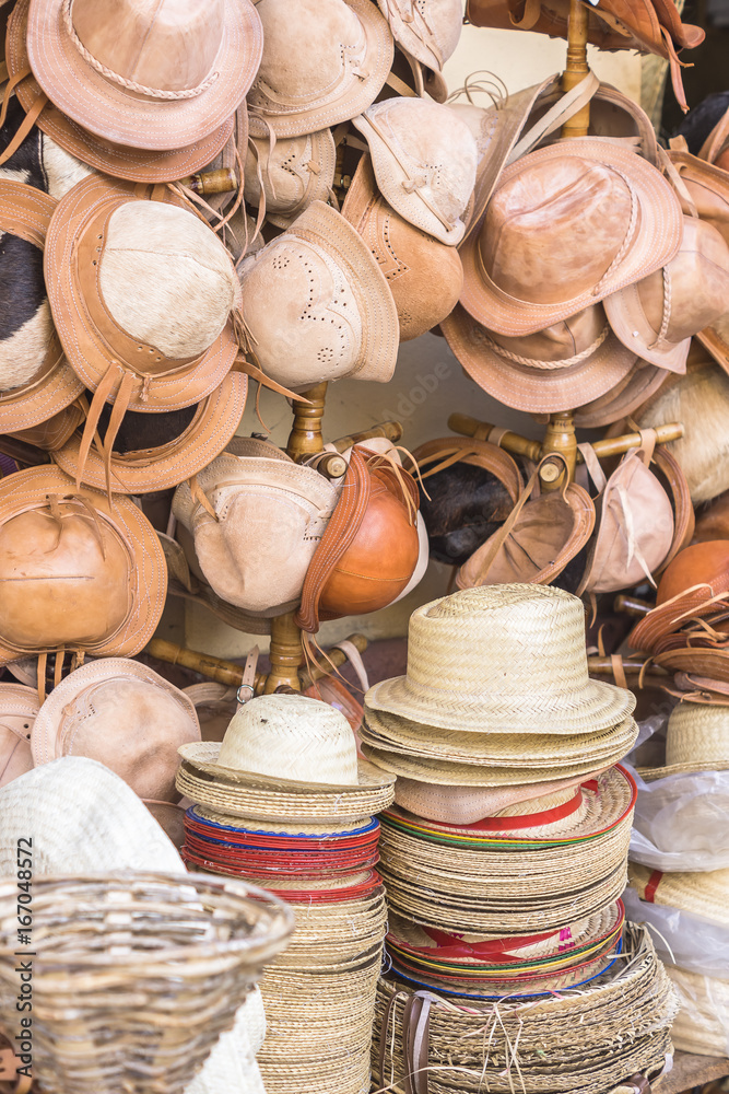 Leather and straw hats in craft store Brazil