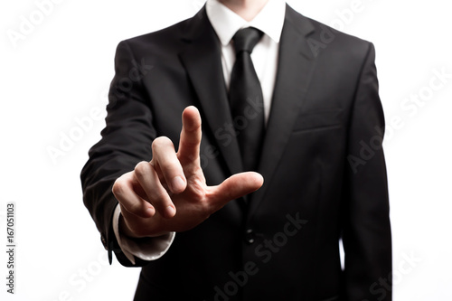 Businessman pointing his finger isolated on a white background