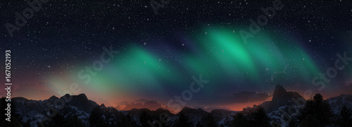 Fotografie A beautiful green and red aurora dancing over the hills