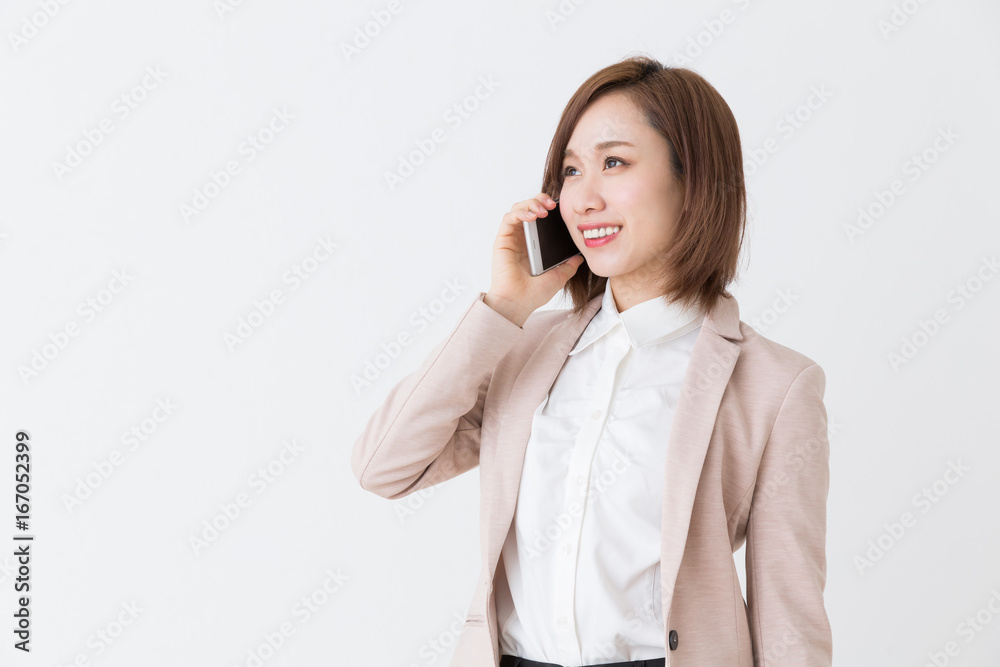 電話をする女性 ビジネス 電話をする女性 ビジネス