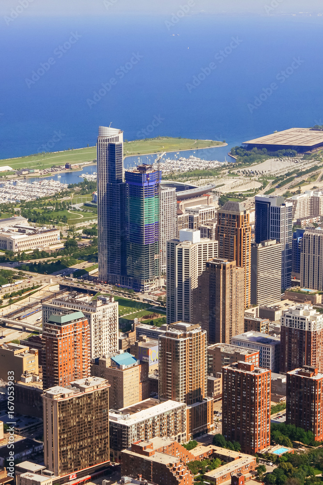 CHICAGO, USA - 20 July, 2017: Chicago Skyline aerial view with park and marina full of boats CHICAGO, USA - 20 July, 2017: Chicago Skyline aerial view with park and marina full of boats