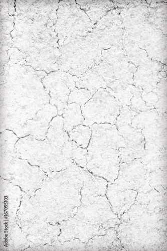 Soil cracks texture white background for design. © peekeedee