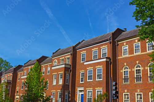 Historic red brick townhouses in Georgetown neighborhood of Washington DC, USA. Historic urban architecture of US capital in spring.